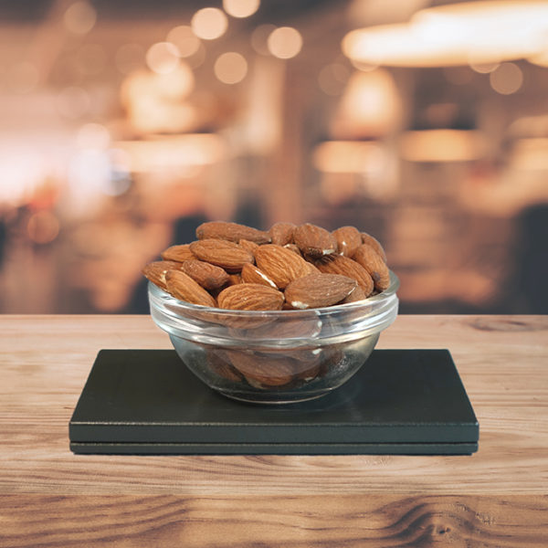 Wood texture table top (counter bar) with blur light gold bokeh in cafe,restaurant background.For montage product display or design key visual layou